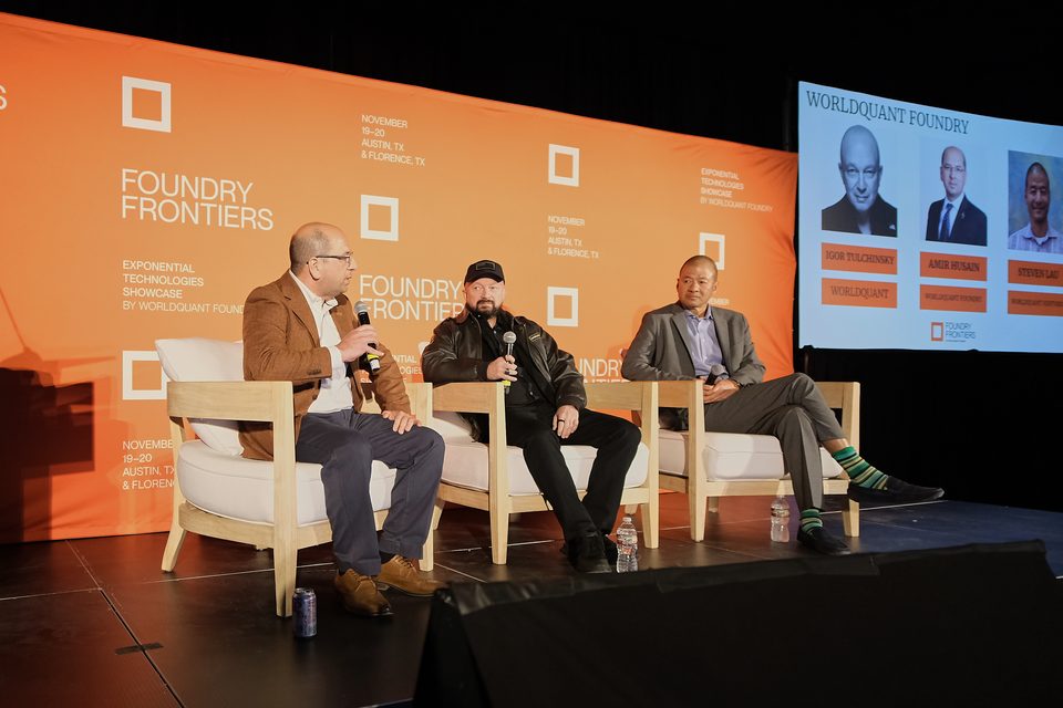 Amir Husain on stage with Igor Tulchinsky and Steven Lau at Foundry Frontiers 2025