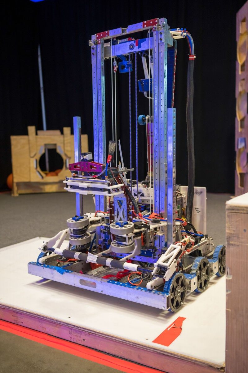 Liberty Hill, Eanes and other central Texas ISD Robotic teams participated in impressive demonstrations. One of their robots is on display here with obstacles and goals in the background.